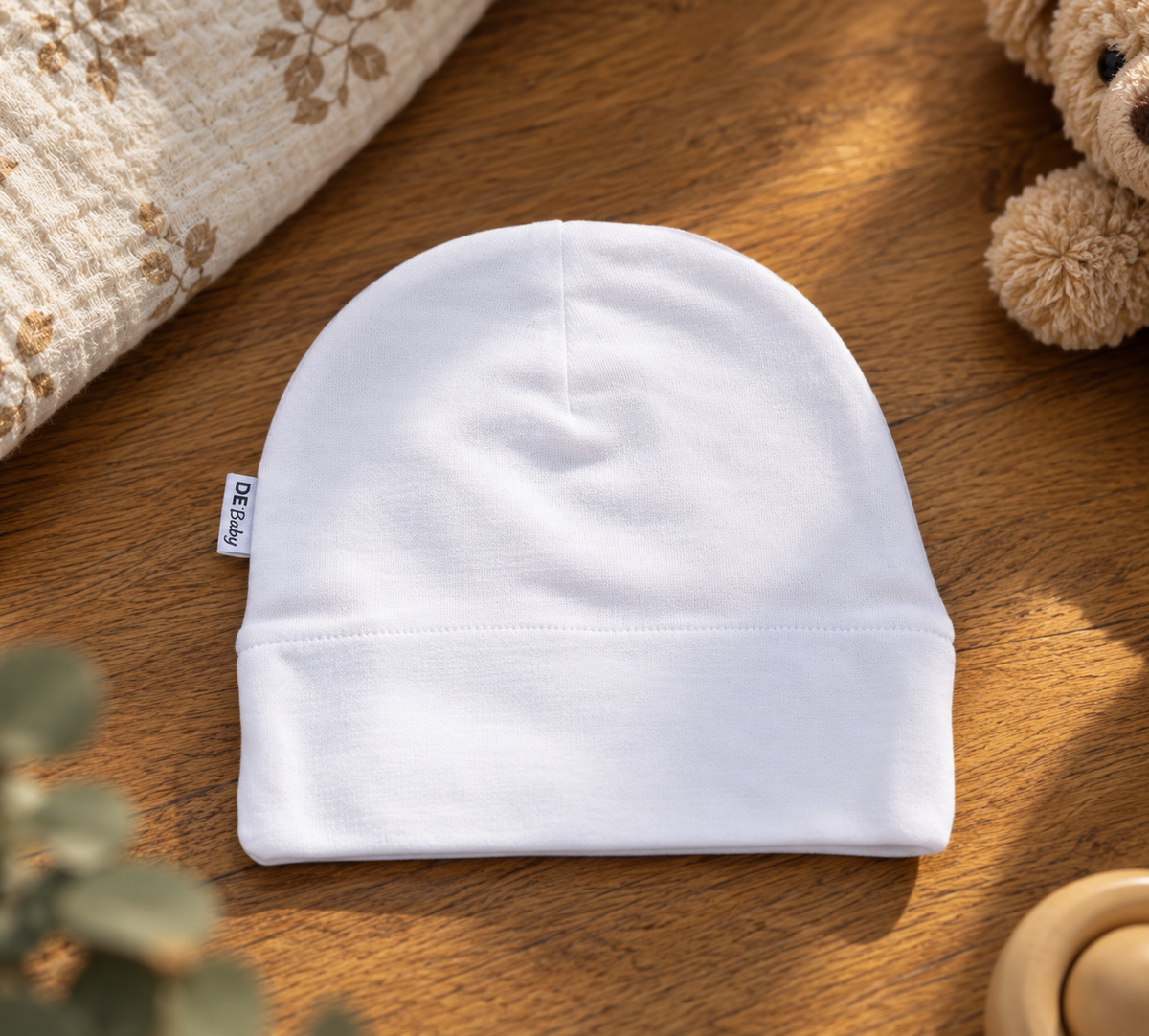 Weiße Babymütze von DE Baby für Neugeborene
